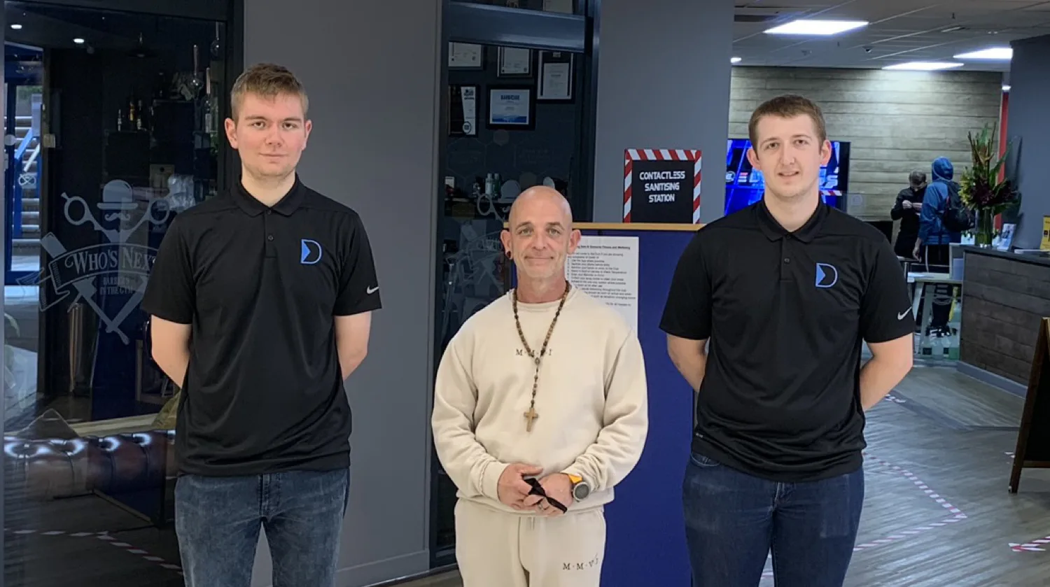 Danny and Ethan from DACCAA with a client at their Stafford business